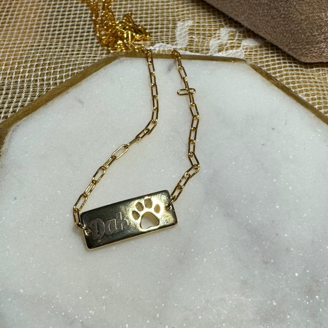 Paw cutout engraved necklace from Karizustyle, San Antonio